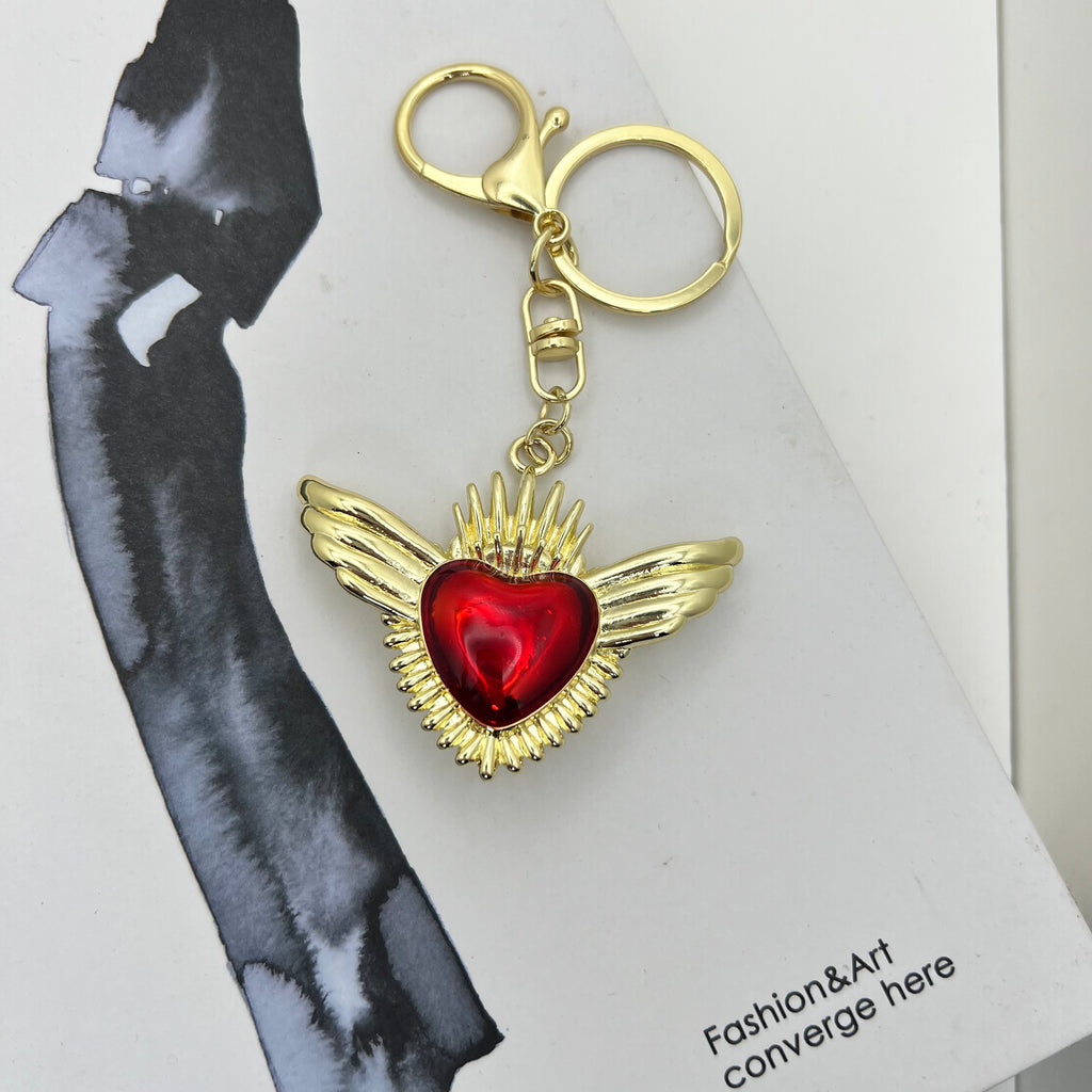 Bag Charm Corazón Rojo con Alas Doradas